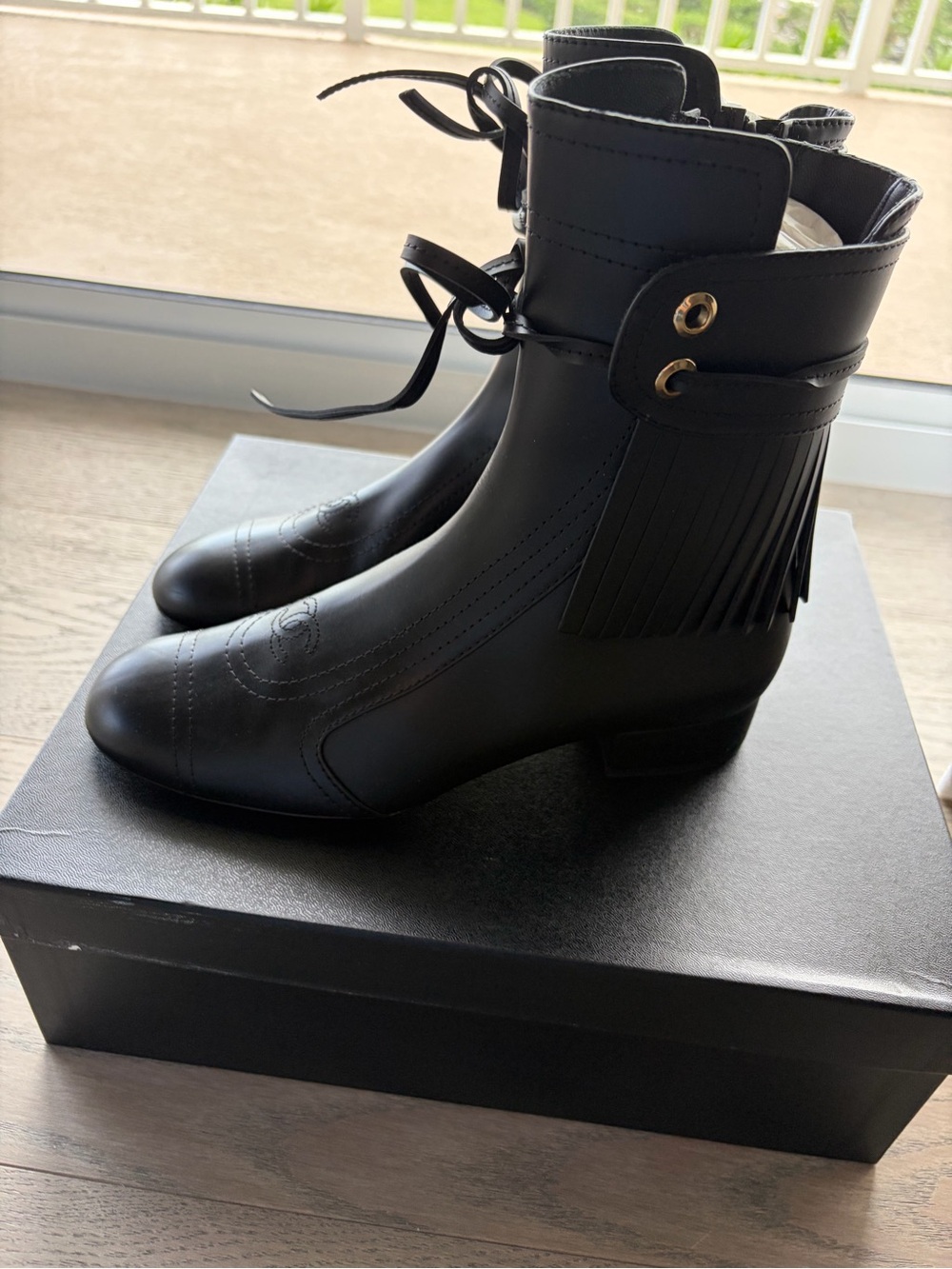 CHANEL Black Leather Fringe Ankle Boots. EXCELLENT condition